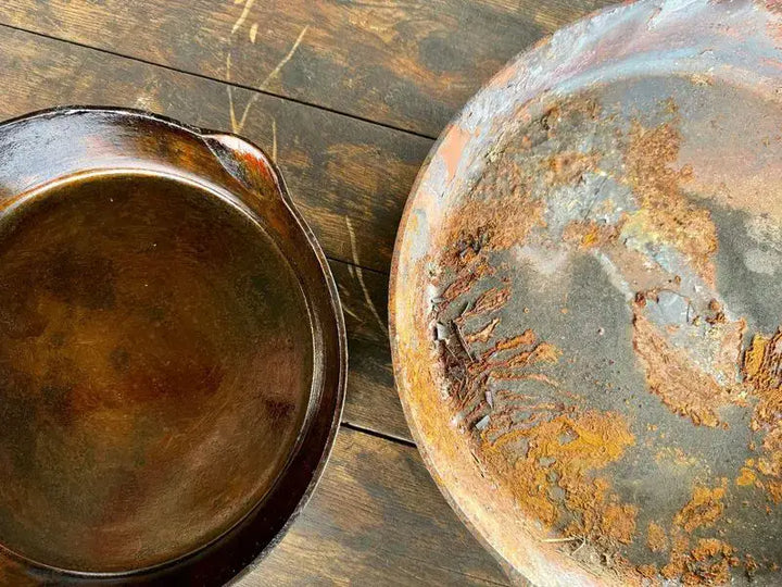 Seasoned cast iron skillet and rusty pan.